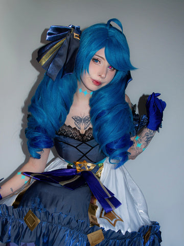 League of Legends Gwen cosplay featuring a high-quality voluminous blue curly Koollia wig and a detailed doll-style blue dress with gold accents.