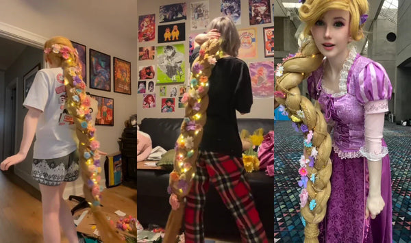 The finished DIY Rapunzel wig featuring Koollia hair, glowing fairy lights, and colorful flowers, worn in full cosplay at a convention