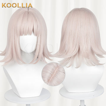 Front and back views of the Nanami Chiaki cosplay wig from Danganronpa, featuring short pastel pink hair with outward curls and a close-up inset of the top crown detail.