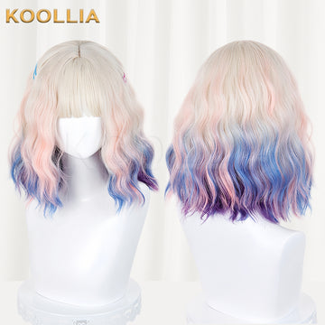 Enid Sinclair wig with blonde roots and pastel pink blue purple ends